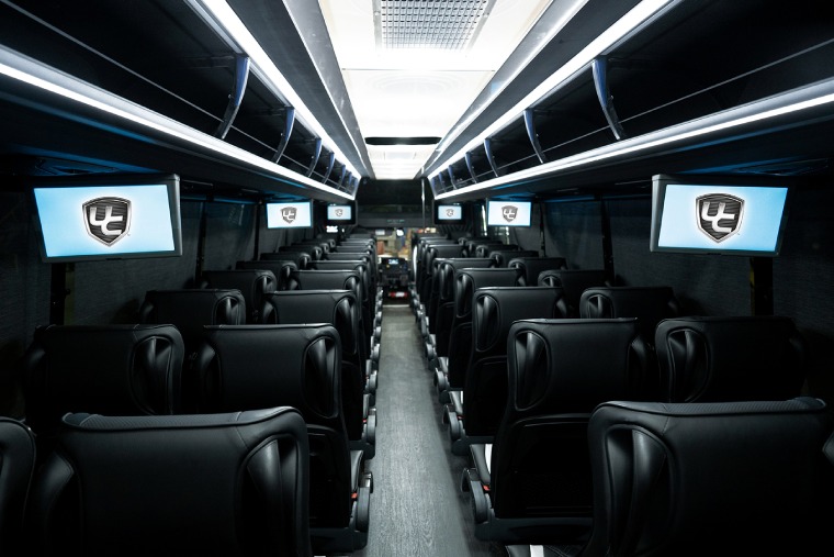 Enhancing the Bus Passenger Experience Comfortable seats inside a luxury coach bus