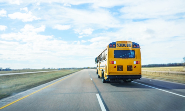 School bus driving on freeway